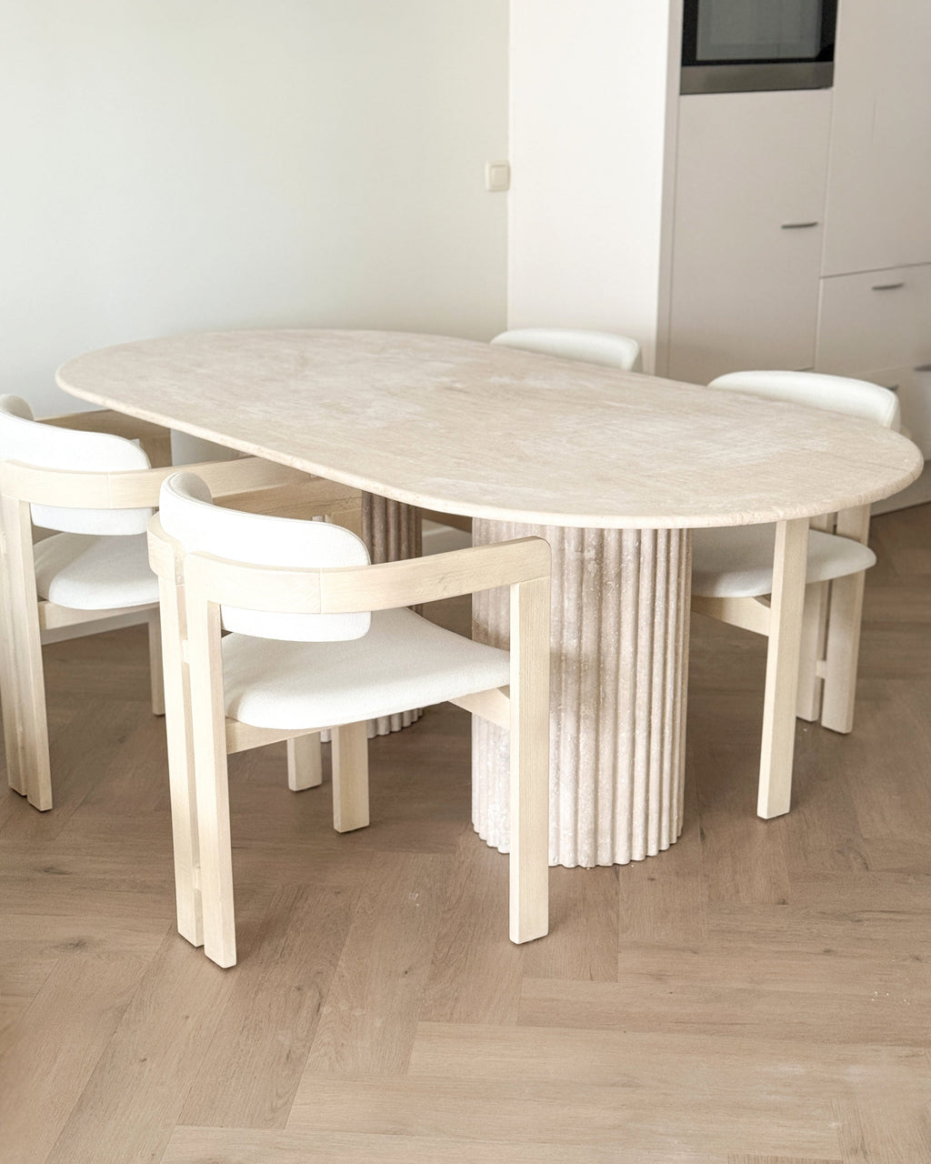 Oval Travertine Dining Table - Fluted Legs